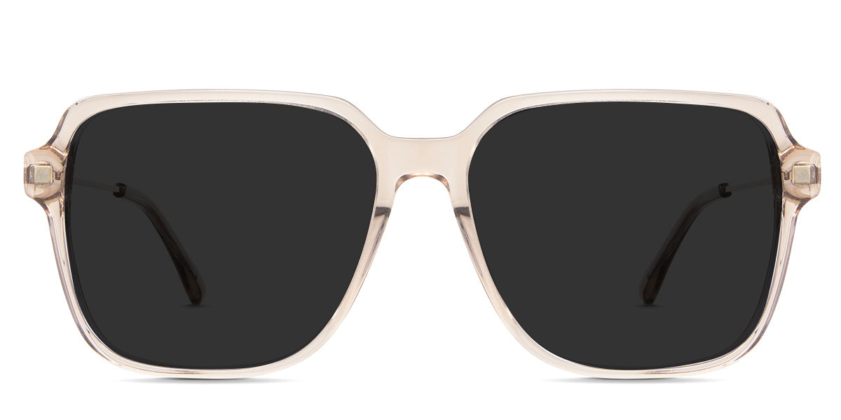 Elma Gray Polarized in noisette variant - it's a square transparent frame with an acetate rim and metal temple arm.