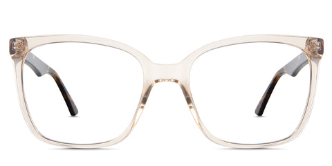 Elona eyeglasses in the pinecone variant - it's a square transparent frame in color beige.