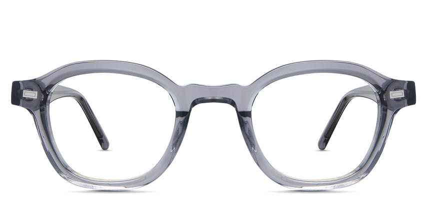 Ghent eyeglasses in the cerulean variant - is a round transparent frame with a wide nose bridge.