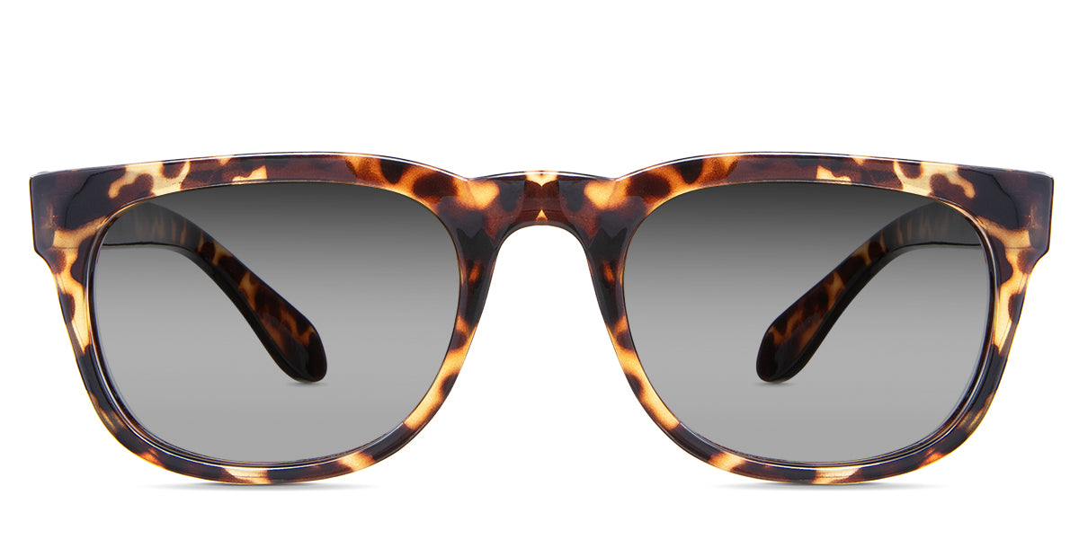 Jett black tinted Gradient  sunglasses in the Ocelot variant - it's a full-rimmed frame with a high nose bridge and a broad temple arm and tips.
