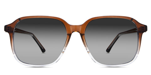 Kata black tinted Gradient sunglasses in felis variant it's a square oversized frame and it's a transparent frame with built-in nose bridge.