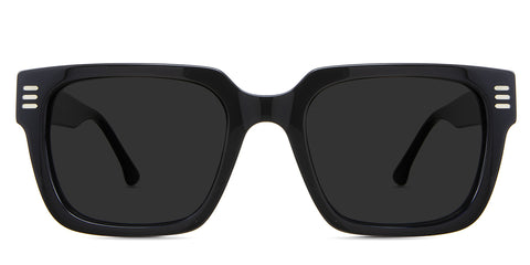 Kendra black tinted Standard Solid
 in the Midnight variant - it's a square frame with three gold bar revits in the end piece and a broad temple arm.