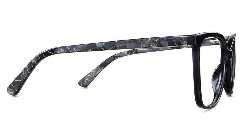 Kimberly eyeglasses in the midnight variant - have a patterned color acetate temples.