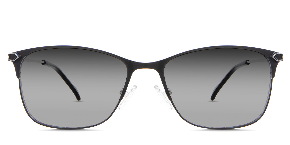 Kira black tinted Gradient sunglasses in the beluga variant - it's a metal frame with a narrow U-shaped nose bridge and a unique design connecting the endpiece to the temple arm.