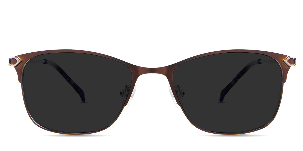 Kira black tinted Standard Solid sunglasses in the beluga variant - it's a metal frame with a narrow U-shaped nose bridge and a unique design connecting the endpiece to the temple arm.