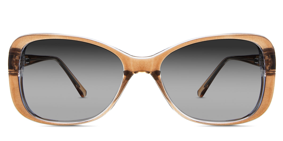 Lois black tinted Gradient in the Ocher variant - is a two-toned oval frame with a slim temple arm.