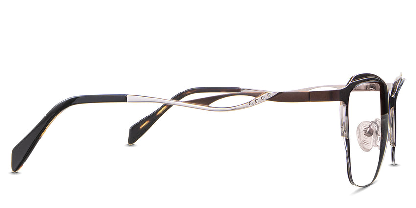 Lux eyeglasses in the acorn variant - have a diamond rivets emboss in the arms.