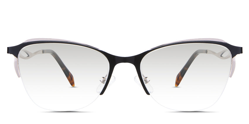 Lux Black Tinted Gradient in the Melanites variant - it's a cat-eye-shaped frame with a U-shaped nose bridge and has a combination of metal and acetate temples.