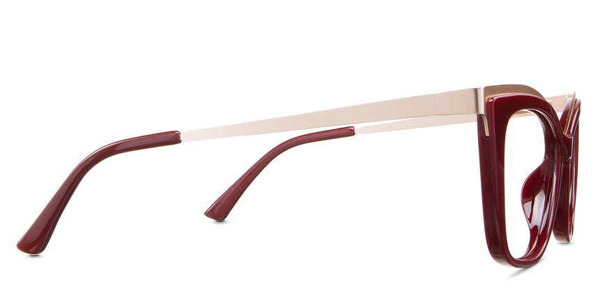 Lyric eyeglasses in the burgundy variant - have a metal temple arm.