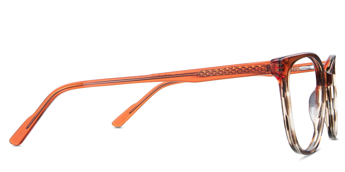 Maggie eyeglasses in the auburn variant - have a visible wire core in the arm.