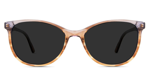 Maggie black tinted Standard Solid in the Tut variant - it's an oval shape frame with a narrow-width nose bridge and a slim temple.