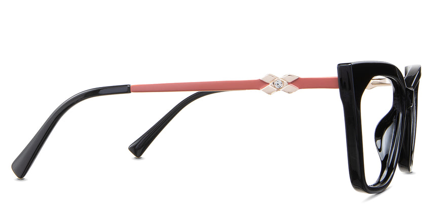 Malia eyeglasses in the lasius variant - have a gold and blue metal arm and white acetate tips.