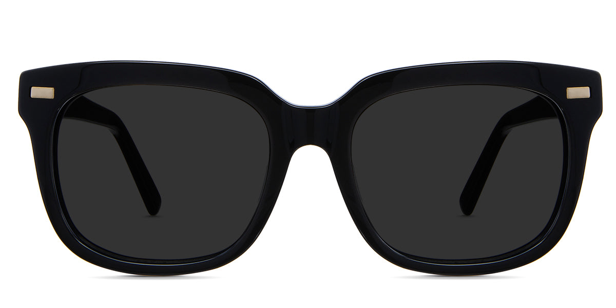 Mun Black Sunglasses Standard Solid in the midnight variant - have a broad rim with small rectangular metal emboss on the end piece and a U-shaped nose bridge.