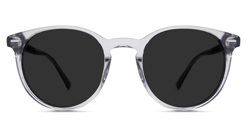 Nasio Gray Polarized in stone variant - it's a transparent frame with a round viewing lens and a thin round rim.