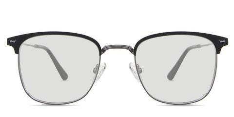 Nelson black tinted Standard Solid  in the Koko variant - it's a square frame with adjustable nose pads and has a combination of metal arm and acetate tips.