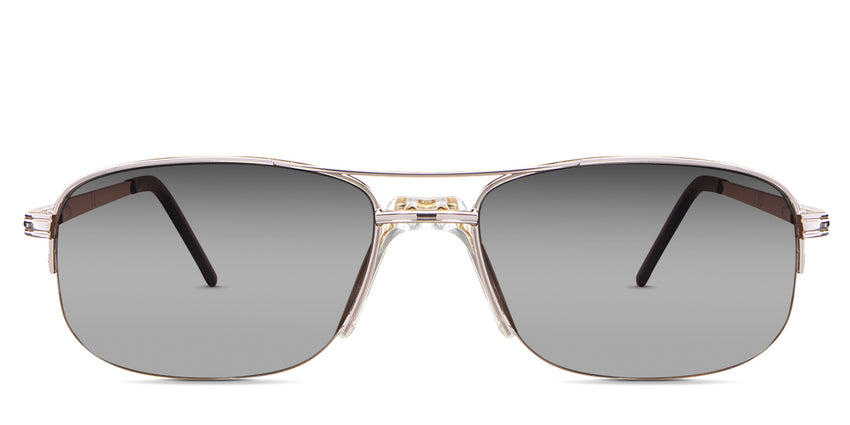 Niral black tinted Gradient  in the Macaroon variant - It's a half-rimmed rectangular frame with two bar metal temples and a slim temple arm.