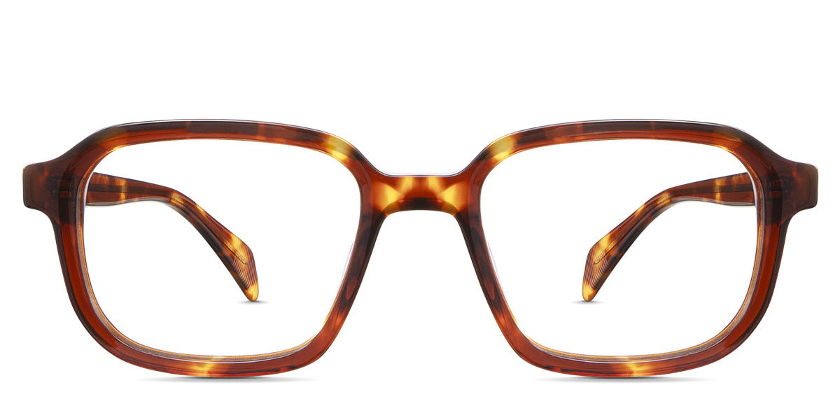 Niro eyeglasses in the cinnamon variant - it's a rectangular thin frame in tortoise color.