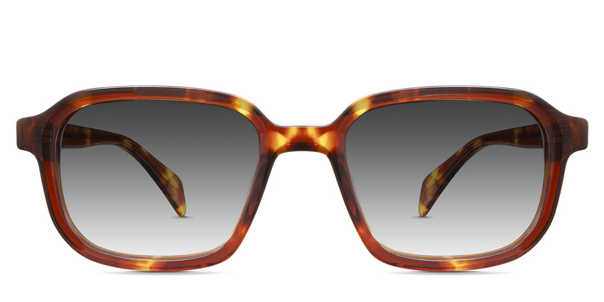 Niro Black Sunglasses Gradient in the Cinnamon variant - it's a rectangular thin frame in tortoise color with a patterned wire core visible in the arm.