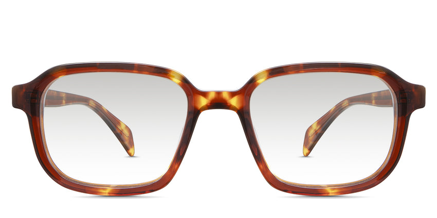 Niro Black Tinted Gradient in the Cinnamon variant - it's a rectangular thin frame in tortoise color with a patterned wire core visible in the arm.