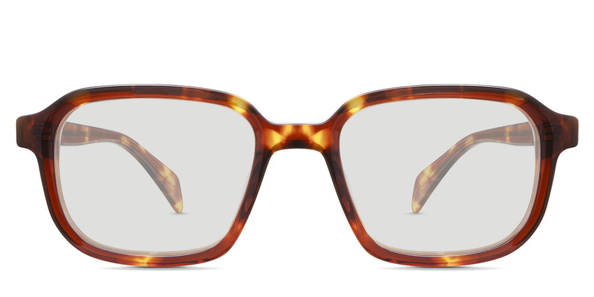 Niro Black Tinted Solid in the Cinnamon variant - it's a rectangular thin frame in tortoise color with a patterned wire core visible in the arm.