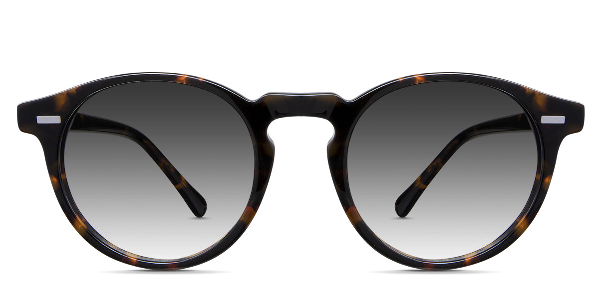 Nito black tinted Gradient sunglasses in the hickory variant - it's a tortoise frame with a keyhole shape nose bridge and straight-cut temple arm.