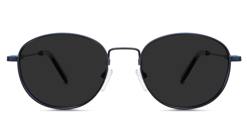 Noa black tinted Standard Solid sunglasses in the Admiral variant - is a round metal frame with a wide nose bridge and adjustable silicon nose pads.