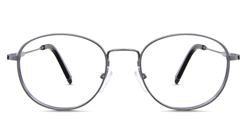 Noa eyeglasses in the gun variant - it's a combination of round, oval-shaped frames.