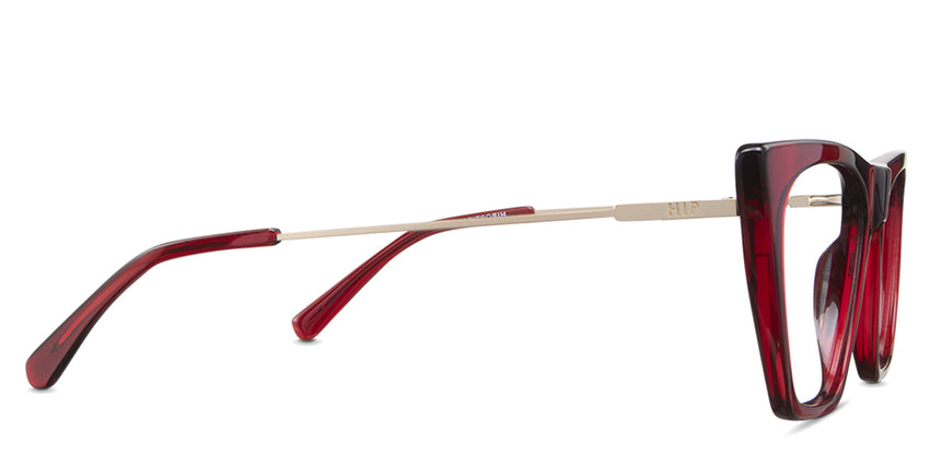 Osta eyeglasses in scarlet variant - have a gold metal arm and red acetate tenple tips.