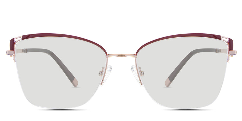 Phoebe black tinted Standard Solid glasses in the Carmine variant - is a metal frame with adjustable nose pads, a thin temple arm, and wide tips.