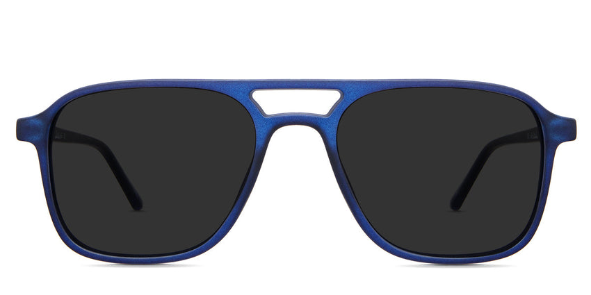 Ralph Gray Polarized in the gentian variant  is a thin, full-rimmed frame with a square viewing lens and frame name, color, and size imprints inside the arm.