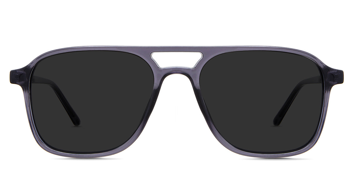 Ralph Gray Polarized in the gentian variant is a thin, full-rimmed frame with a square viewing lens and frame name, color, and size imprints inside the arm.