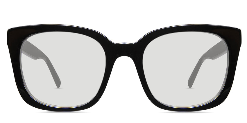 Relta black tinted Standard Solid prescription sunglasses in the onyx variant - it's a square frame with thinner temple tips than the temple arm and has a combination of thin and slightly thick rims.