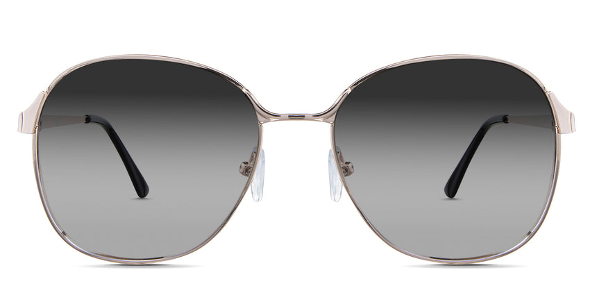 Sara black tinted Gradient   sunglasses in the Buff variant - is a metal frame with silicon adjustable nose pads and has a combination of metal and acetate temples.
