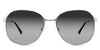 Sara black tinted Gradient   sunglasses in the Guinea variant - it's a full-rimmed frame with a narrow-sized nose bridge and a slim temple arm.