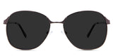 Sara black tinted Standard Solid sunglasses in the Nutmeg variant - are a round frame with a decorative nose bridge and 140mm temple arm length.