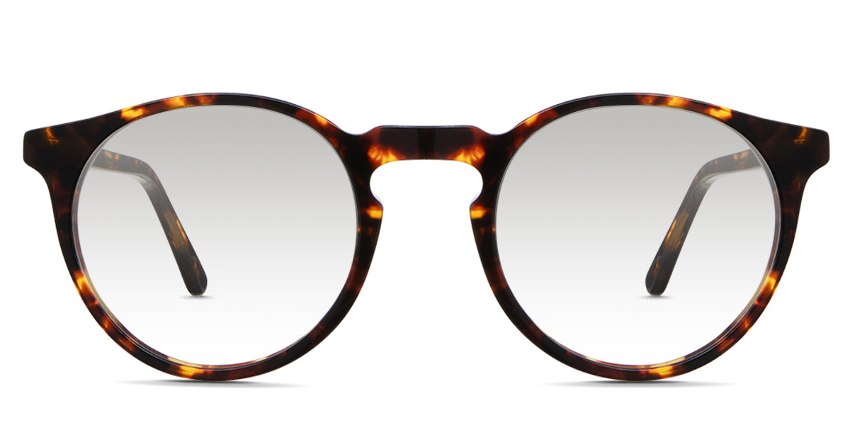 Seraph black tinted Gradient sunglasses in Delaney variant - it's a rounded acetate frame in tortoise pattern and have a high keyhole nose bridge.