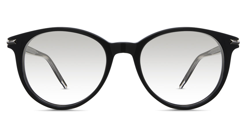 Sile black tinted Gradient sunglasses in cattle variant - it's a round frame with a slightly cat-eye look with a brushed metal style on the inside of the arm.