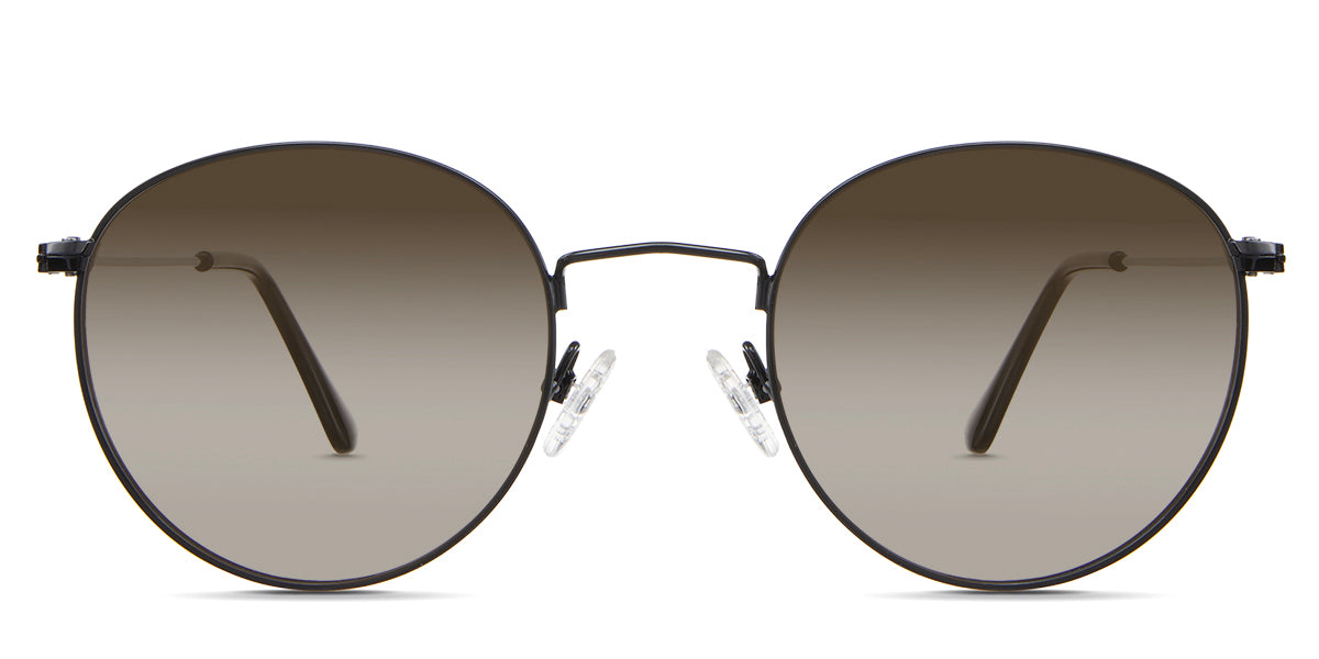 Sol Brown Sunglasses Gradient in the Sumi variant - it's a thin round frame with silicon adjustable nose pads and frame information written inside the temple tips front