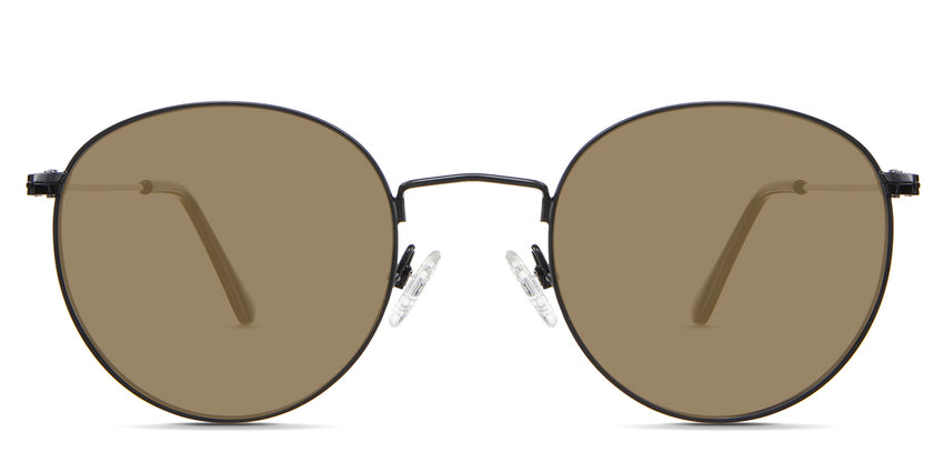 Sol Beige Standard Solid in the Sumi variant - it's a thin round frame with silicon adjustable nose pads and frame information written inside the temple tips front