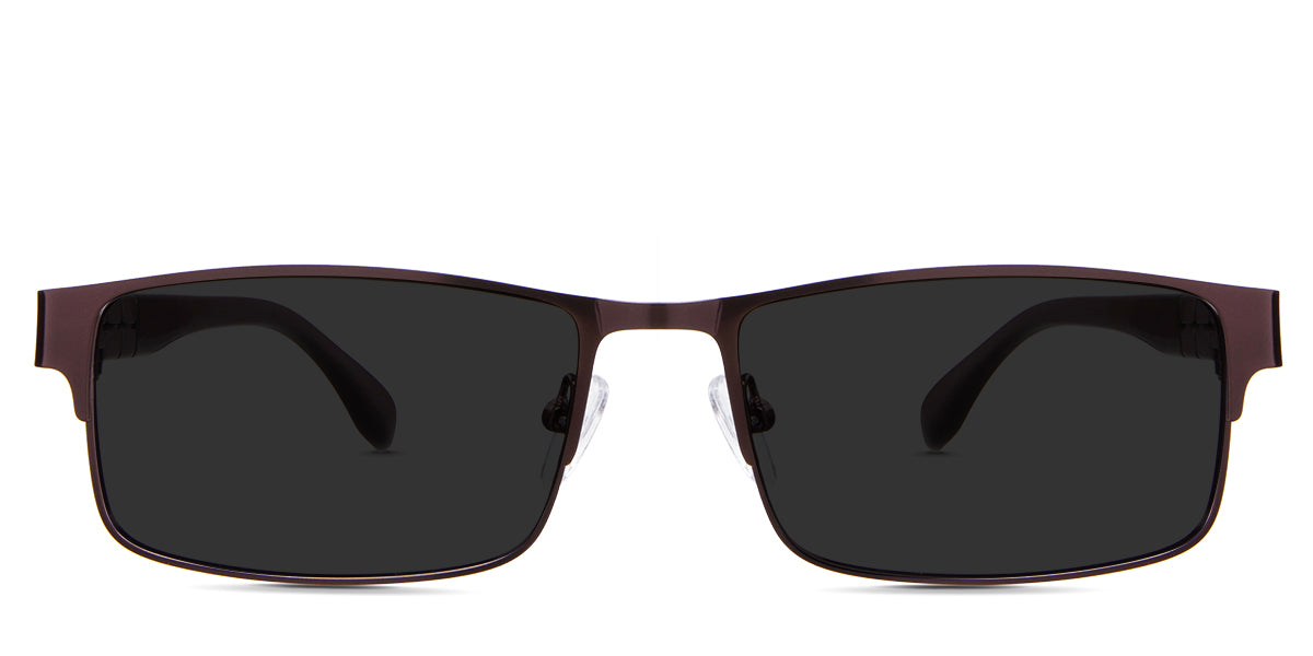 Sugi Black Sunglasses Standard Solid in the ristretto variant - is a rectangular frame with an adjustable nose pad and a carving pattern in the temple arm.