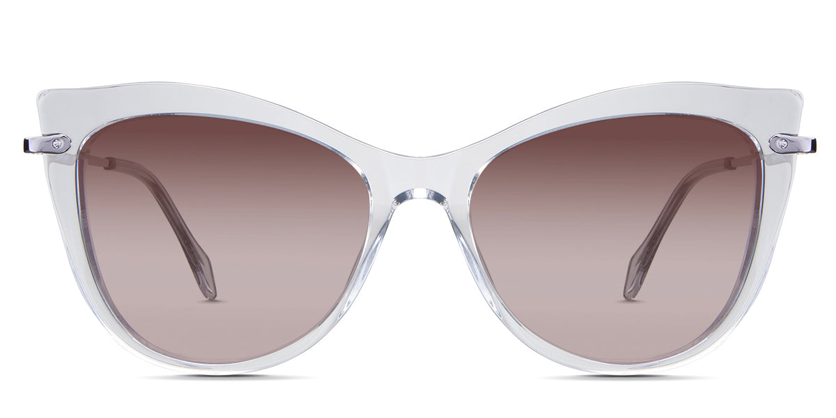 Susan Rose Sunglasses Gradient in the Crystal variant - is a cat-eye frame with a U-shaped nose bridge and a combination of metal arm and acetate tips.