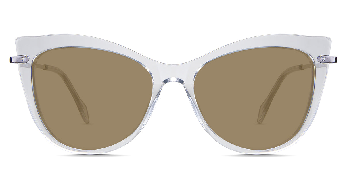 Susan Beige Sunglasses Solid in the Crystal variant - is a cat-eye frame with a U-shaped nose bridge and a combination of metal arm and acetate tips.