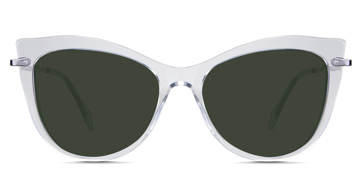 Susan Green Sunglasses Solid in the Crystal variant - is a cat-eye frame with a U-shaped nose bridge and a combination of metal arm and acetate tips.