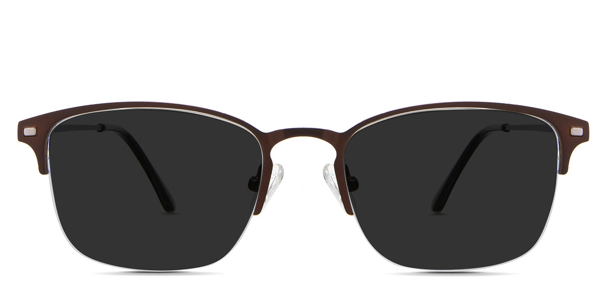 Tane black tinted Standard Solid sunglasses in the rooks variant - it's a half-rimmed metal frame with a keyhole-shaped nose bridge.