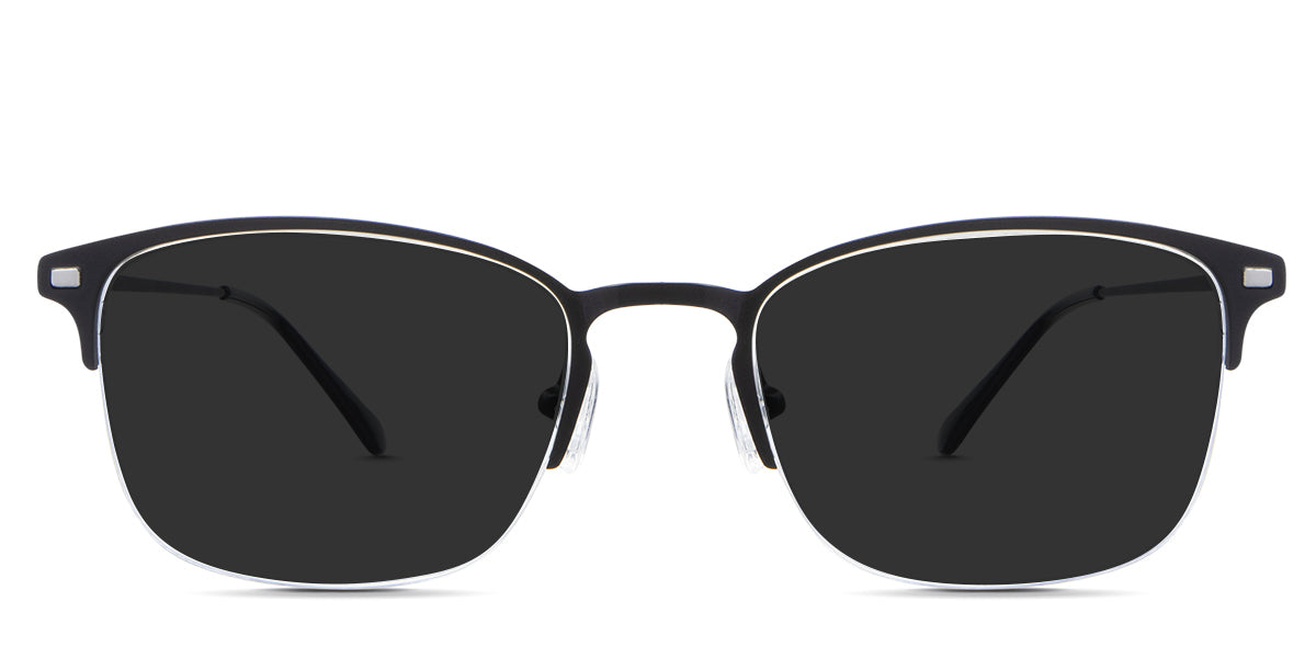 Tane black tinted Standard Solid sunglasses in the rooks variant - it's a rectangular frame with an extended end piece with rectangle metal embossing.