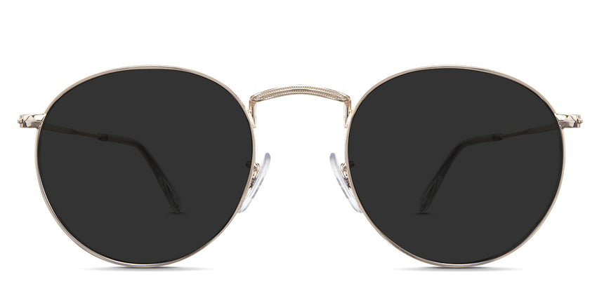 Targo black tinted Standard Solid sunglasses in the baroque variant - it's a round thin metal frame with a wide adjustable nose bridge.