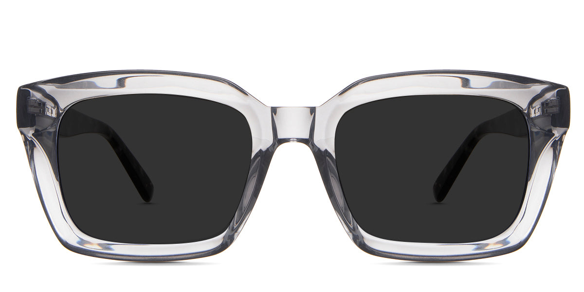 Willa Gray Polarized in the Andalusian variant - it's a square frame with a wide V-shaped nose bridge and a thick arm.