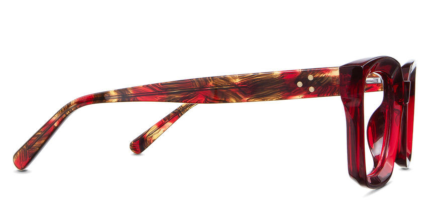Willa Eyeglasses in the poinsettia variant - it has a multi-color temple arm.