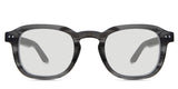 Zuri black tinted Standard Solid glasses in melanite variant - is a full rimmed frame with keyhole shaped nose bridge and acetate temple arms.
