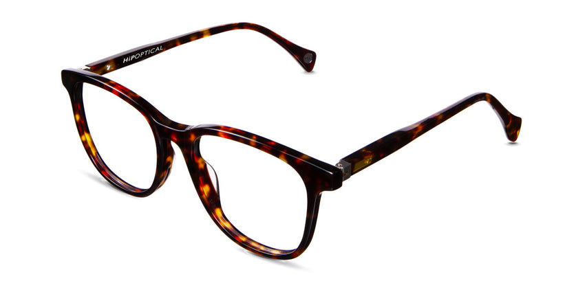 Grimm Jr prescription eyeglasses in maple shadows variant - it's a tortoise frame with brown, black and golden brown color.